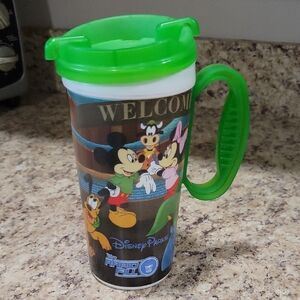 Disney Parks Mug with Green Lid and Handle
